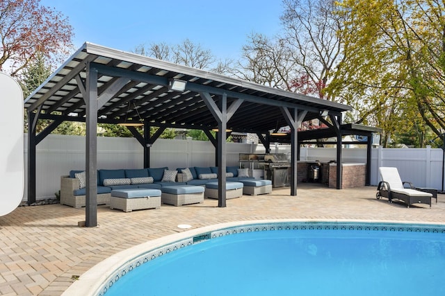 2110 Pfingsten Rd, Northbrook, IL 60062 - view of swimming pool featuring area for grilling, a gazebo, an outdoor hangout area, and a fenced backyard