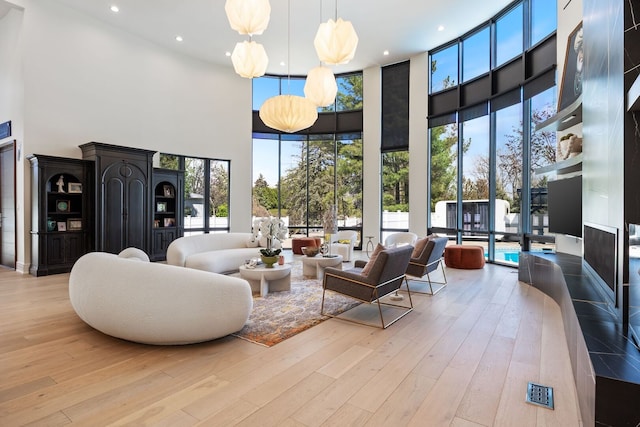 2110 Pfingsten Rd, Northbrook, IL 60062 - common area with a towering ceiling, recessed lighting, and expansive windows