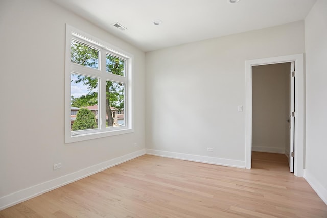 5041 N Octavia Ave, Harwood Heights, IL 60706 - spare room featuring light wood finished floors and baseboards