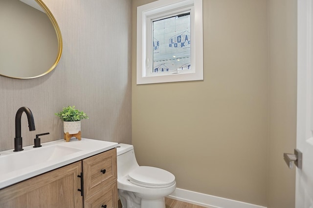 5041 N Octavia Ave, Harwood Heights, IL 60706 - half bath featuring vanity and wood finished floors