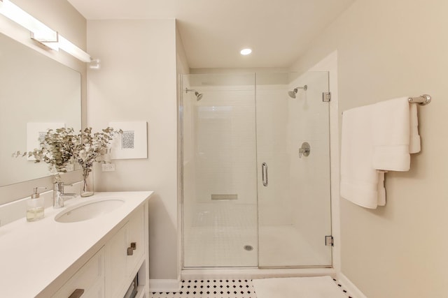 1201 W Wrightwood Ave Unit 22, Chicago, IL 60614 - bathroom with a stall shower, vanity, recessed lighting, and tile patterned floors