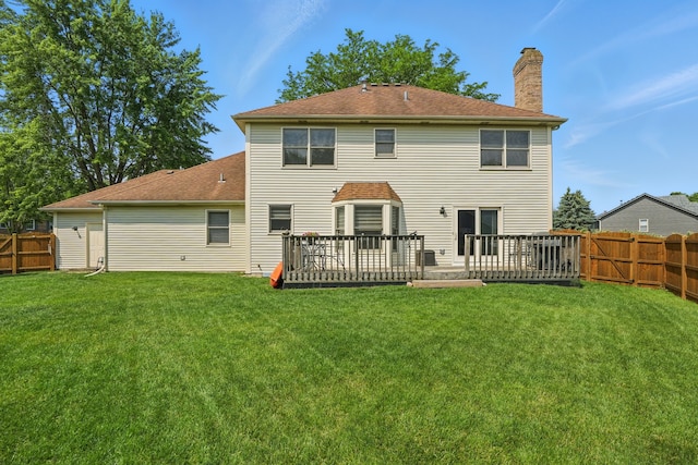 1844 Slippery Rock Rd, Naperville, IL 60565 - back of property featuring a chimney, a fenced backyard, a shingled roof, and a deck