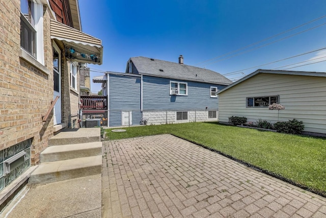 3619 Ridgeland Ave, Berwyn, IL 60402 - rear view of property with a yard and a patio
