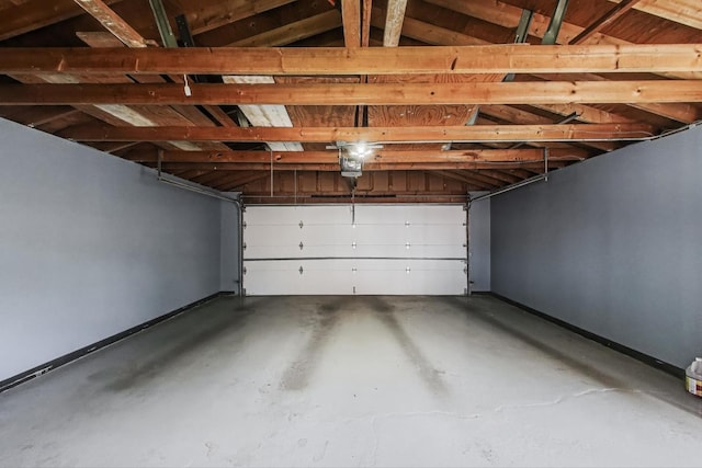 3619 Ridgeland Ave, Berwyn, IL 60402 - garage featuring baseboards and a garage door opener