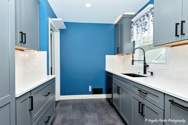 482 S Alfred Ave, Elgin, IL 60123 - kitchen with gray cabinetry, backsplash, light countertops, recessed lighting, and dishwashing machine