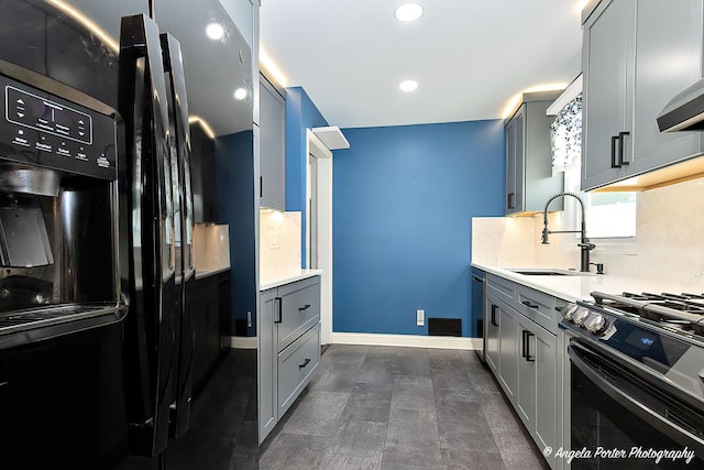 482 S Alfred Ave, Elgin, IL 60123 - kitchen with black appliances, gray cabinetry, backsplash, and recessed lighting