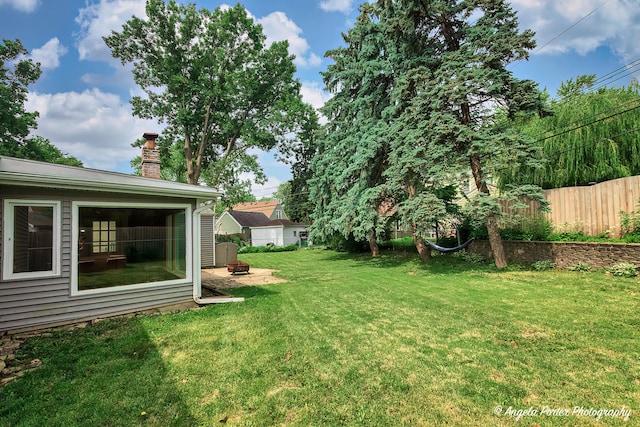 482 S Alfred Ave, Elgin, IL 60123 - view of yard featuring an outdoor fire pit