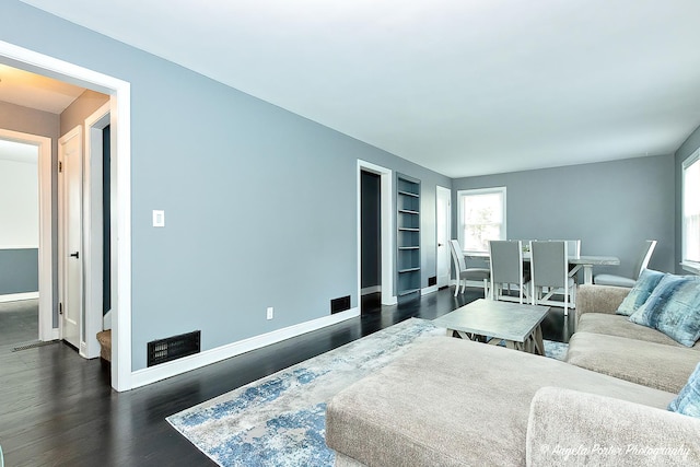 482 S Alfred Ave, Elgin, IL 60123 - bedroom with dark wood finished floors and baseboards