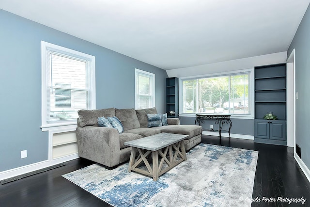 482 S Alfred Ave, Elgin, IL 60123 - living area with dark wood-style flooring and built in features