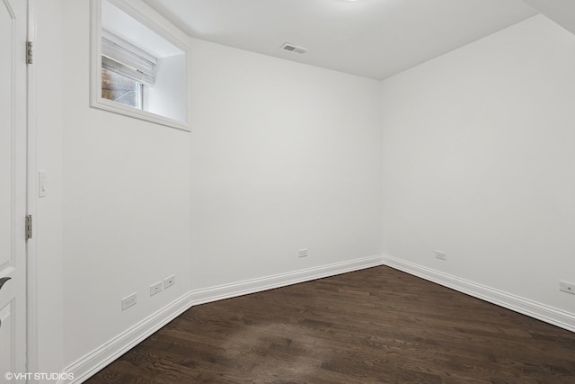 506 W Oakdale Ave Unit 1, Chicago, IL 60657 - unfurnished room with dark wood-style flooring and baseboards