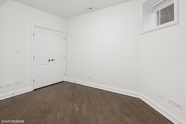 506 W Oakdale Ave Unit 1, Chicago, IL 60657 - spare room featuring dark wood finished floors and baseboards