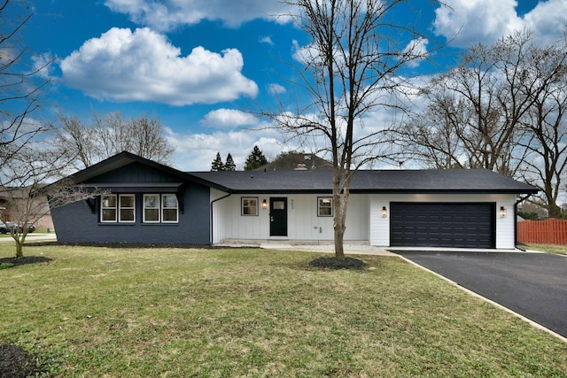 903 Jarvis Ave, Des Plaines, IL 60018 - ranch-style home with an attached garage and asphalt driveway