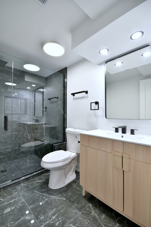 903 Jarvis Ave, Des Plaines, IL 60018 - full bathroom with marble tiled floors, vanity, and a marble finish shower