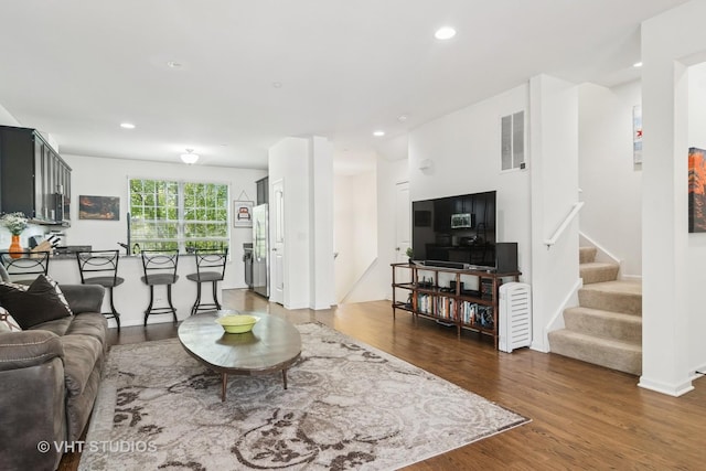 1527 E Arbor Ln, Arlington Heights, IL 60004 - living room with wood finished floors, stairway, and recessed lighting