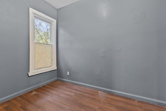 1121 Blaisdell St, Rockford, IL 61101 - unfurnished room featuring wood finished floors and baseboards