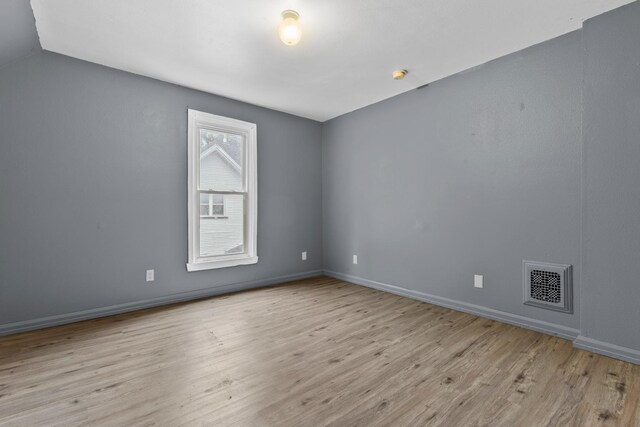 1121 Blaisdell St, Rockford, IL 61101 - unfurnished room with wood finished floors and a smoke detector
