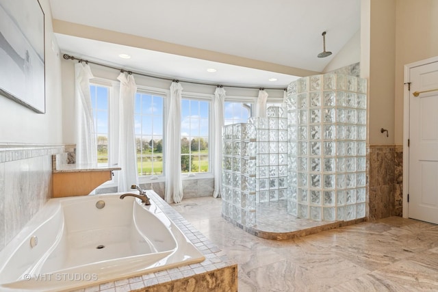 10603 Royal Porthcawl Dr, Naperville, IL 60564 - bathroom with a garden tub, walk in shower, lofted ceiling, recessed lighting, and wainscoting