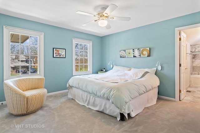 10603 Royal Porthcawl Dr, Naperville, IL 60564 - carpeted bedroom with connected bathroom and a ceiling fan