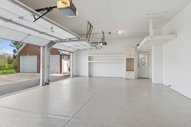10603 Royal Porthcawl Dr, Naperville, IL 60564 - garage featuring a garage door opener