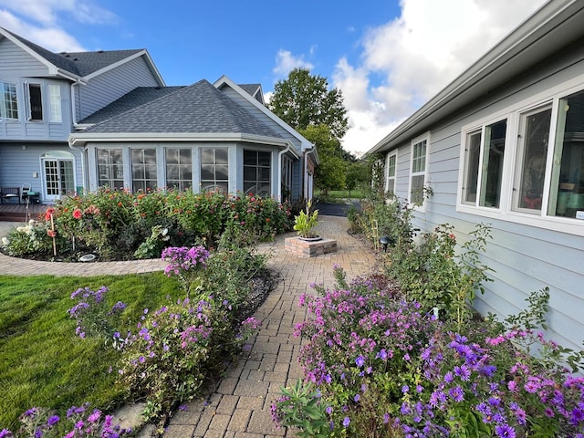 10603 Royal Porthcawl Dr, Naperville, IL 60564 - view of yard with a patio area and a sunroom
