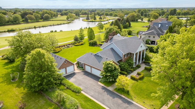 10603 Royal Porthcawl Dr, Naperville, IL 60564 - drone / aerial view of a nearby body of water and a tree filled landscape