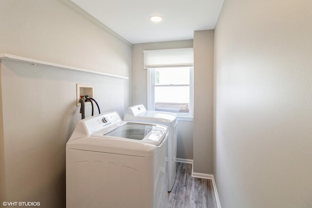407 S York Rd, Bensenville, IL 60106 - laundry room featuring washer and dryer and light wood-type flooring