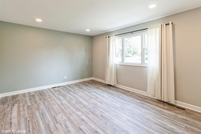 407 S York Rd, Bensenville, IL 60106 - unfurnished room with wood finished floors and recessed lighting
