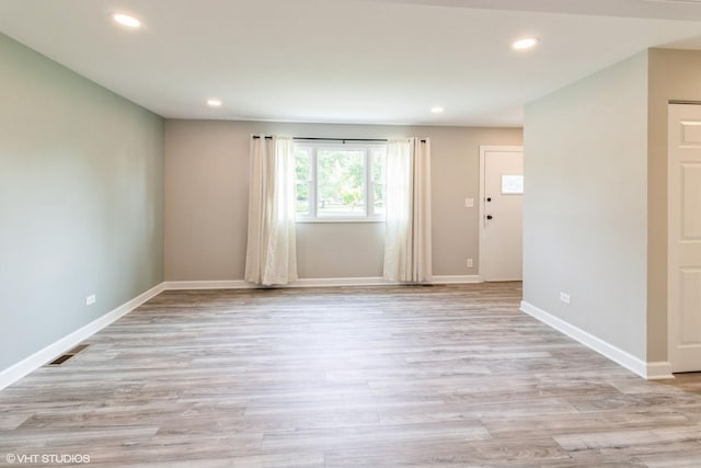 407 S York Rd, Bensenville, IL 60106 - empty room featuring light wood-type flooring and recessed lighting