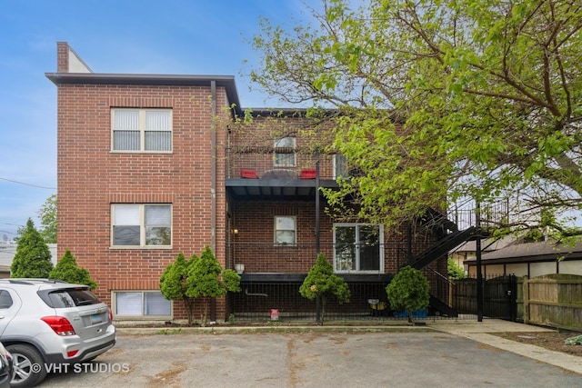 4714 W Berteau Ave Unit 1N, Chicago, IL 60641 - view of front of property featuring brick siding