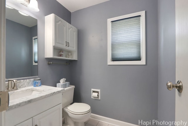 7 Kensington Ct, Streamwood, IL 60107 - half bath with vanity and tile patterned floors