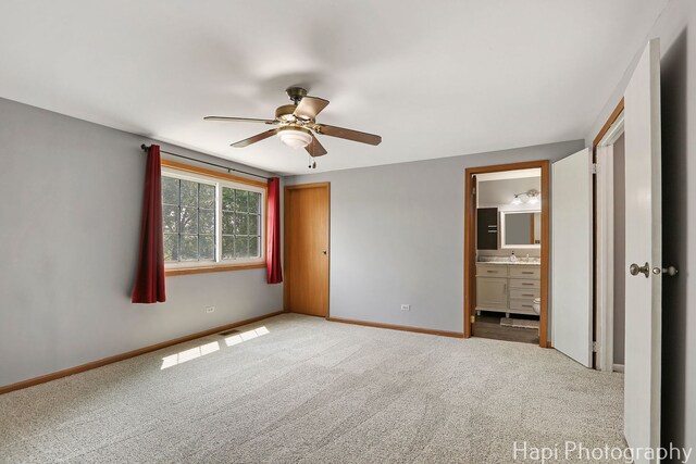 7 Kensington Ct, Streamwood, IL 60107 - unfurnished bedroom with carpet, connected bathroom, and ceiling fan