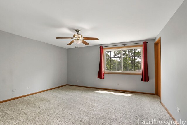 7 Kensington Ct, Streamwood, IL 60107 - unfurnished room featuring light carpet and ceiling fan