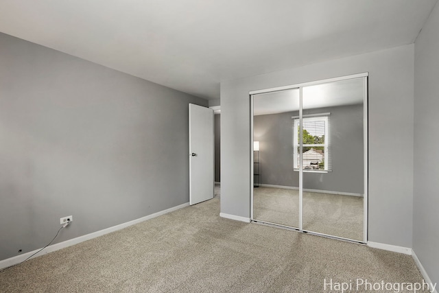 7 Kensington Ct, Streamwood, IL 60107 - unfurnished bedroom with carpet floors and a closet