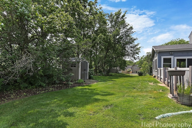 7 Kensington Ct, Streamwood, IL 60107 - view of green lawn featuring a storage shed