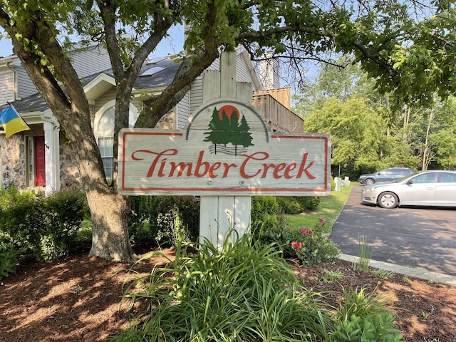 3S043 Timber Dr Unit 043, Warrenville, IL 60555 - view of community / neighborhood sign