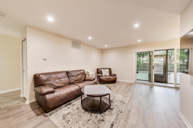 206 Country Ln, Des Plaines, IL 60016 - living area with light wood-style flooring and recessed lighting