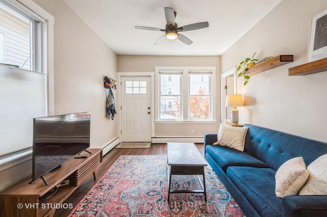 2835 S Farrell St, Chicago, IL 60608 - living room with a baseboard radiator, wood finished floors, and a ceiling fan