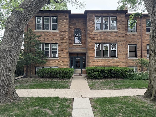 207 W Quincy St Gard, Unit Gard, Riverside, IL 60546 - view of front facade with brick siding