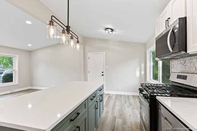 16211 Joyce Cir, South Holland, IL 60473 - kitchen featuring stainless steel appliances, healthy amount of natural light, light wood-type flooring, backsplash, and recessed lighting