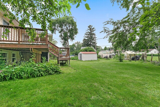 1011 Mark St, South Elgin, IL 60177 - view of yard with a wooden deck, a storage shed, and stairs