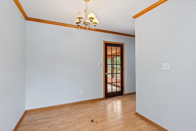 1011 Mark St, South Elgin, IL 60177 - unfurnished dining area featuring ornamental molding, a chandelier, and light wood-style floors