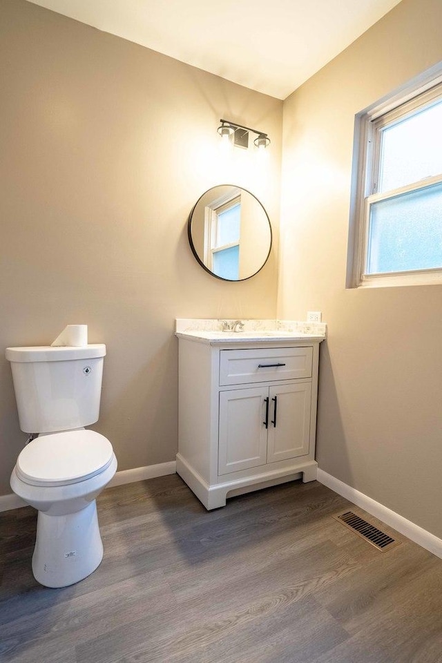 1745 N 40th Ave, Stone Park, IL 60165 - bathroom featuring wood finished floors and vanity