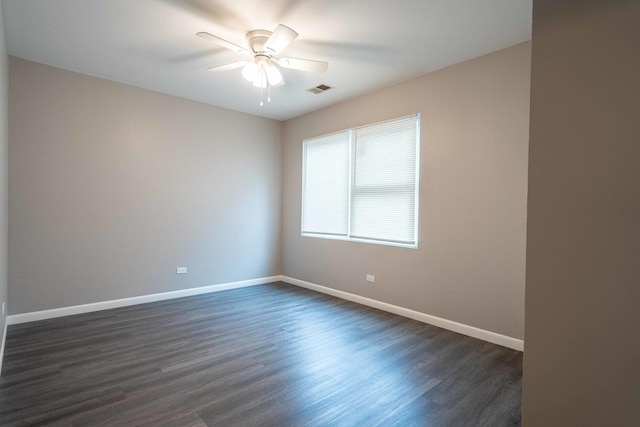 1745 N 40th Ave, Stone Park, IL 60165 - empty room featuring dark wood-style flooring and a ceiling fan