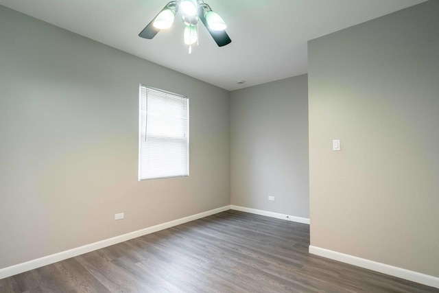 1745 N 40th Ave, Stone Park, IL 60165 - spare room featuring dark wood-style flooring and a ceiling fan