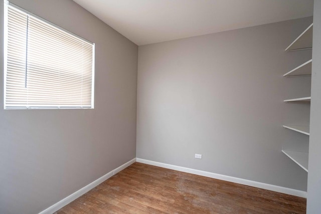 1745 N 40th Ave, Stone Park, IL 60165 - spare room featuring wood finished floors and baseboards