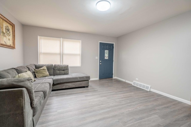 1745 N 40th Ave, Stone Park, IL 60165 - living area with light wood finished floors and baseboards