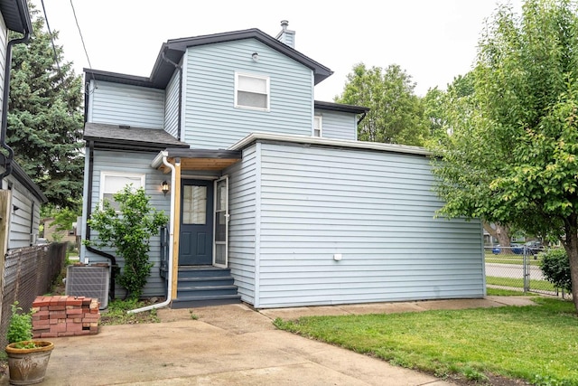 1745 N 40th Ave, Stone Park, IL 60165 - view of front of property with entry steps and a patio area