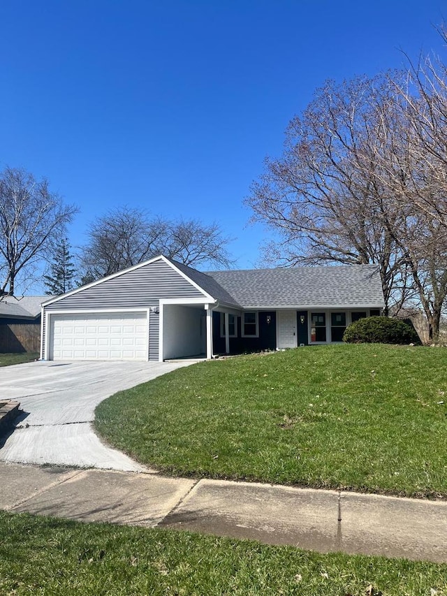 165 Arrowhead Ln, Bolingbrook, IL 60440 - ranch-style home with driveway, an attached garage, a front yard, and roof with shingles