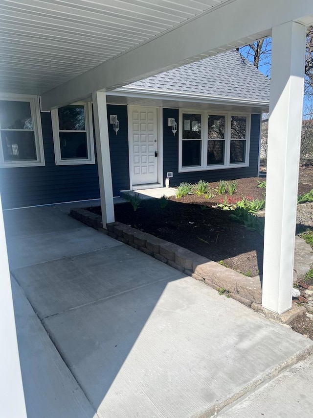 165 Arrowhead Ln, Bolingbrook, IL 60440 - doorway to property with a shingled roof