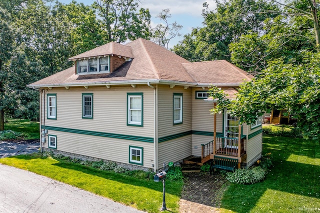 14723 Kildare Ave, Midlothian, IL 60445 - view of home's exterior with a yard and roof with shingles